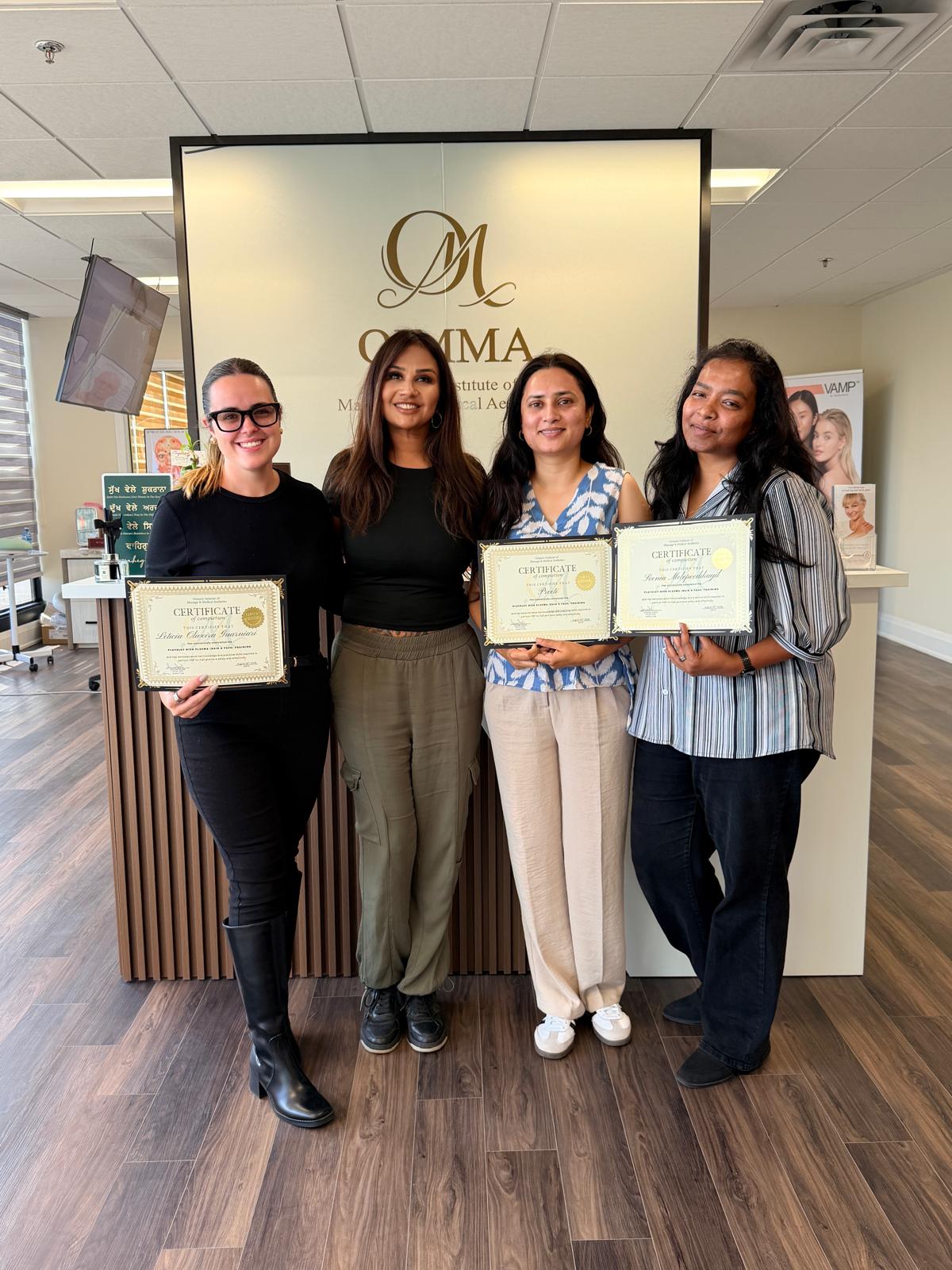 OIMMA students with their graduation certificates