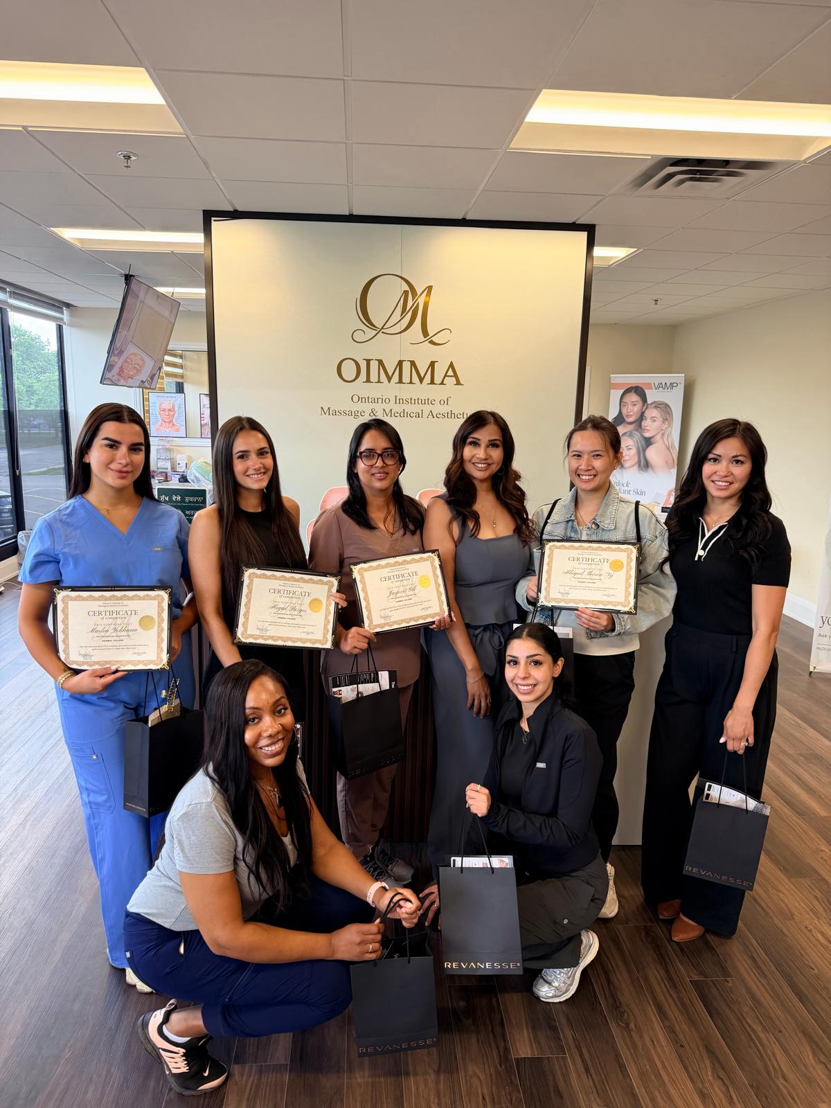 OIMMA graduates celebrating together
